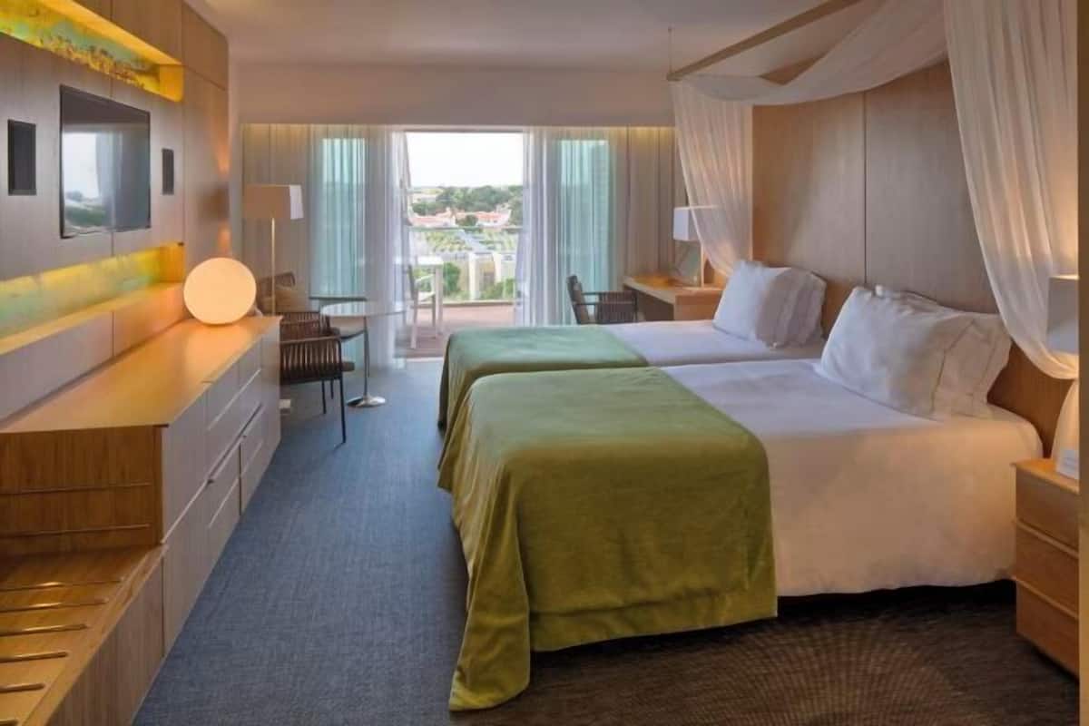 1 habitación, ropa de cama de alta calidad y minibar
