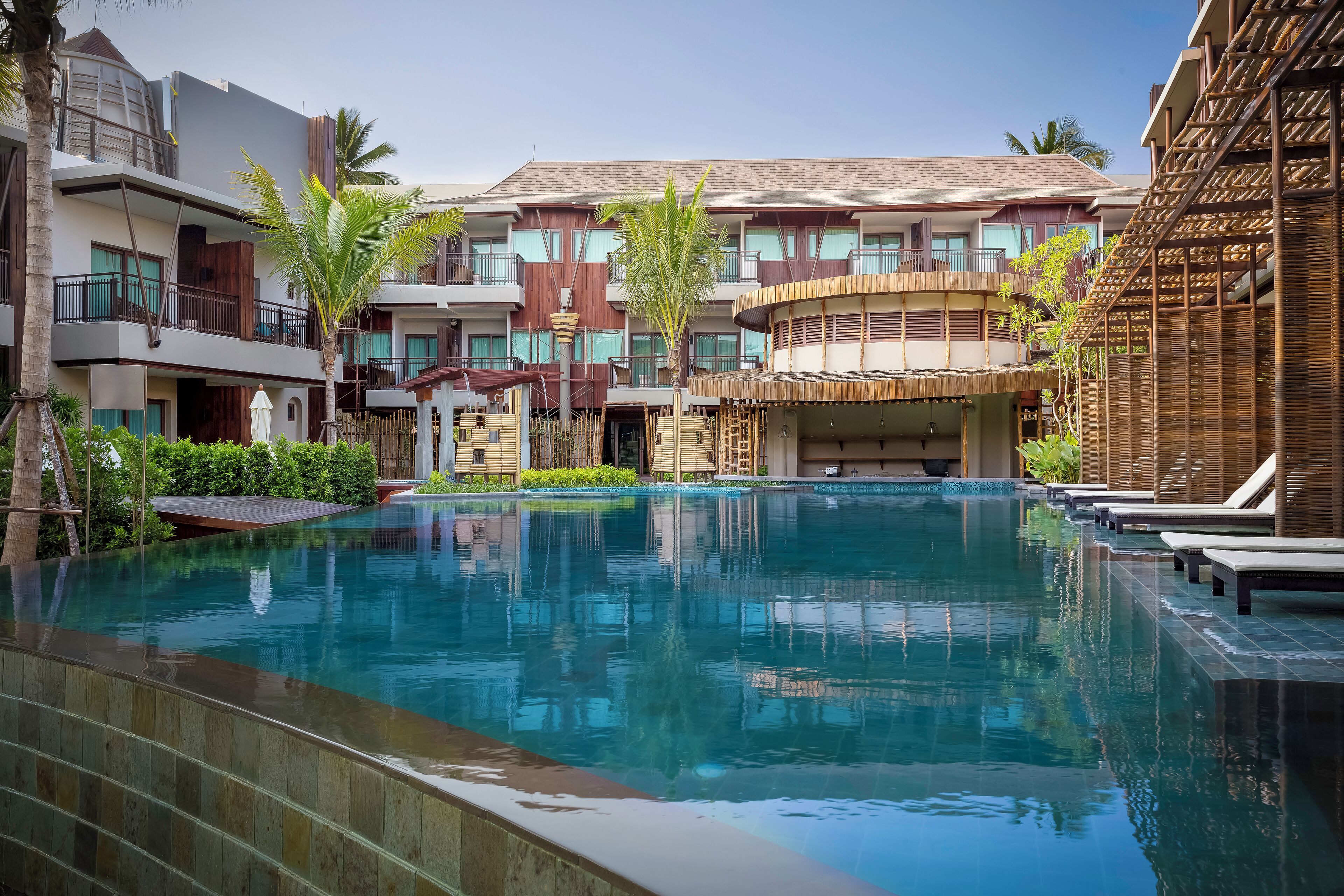 2 outdoor pools, open 8:00 am to 8:00 pm, pool umbrellas, pool loungers