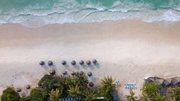 Private beach, white sand, beach umbrellas, beach towels