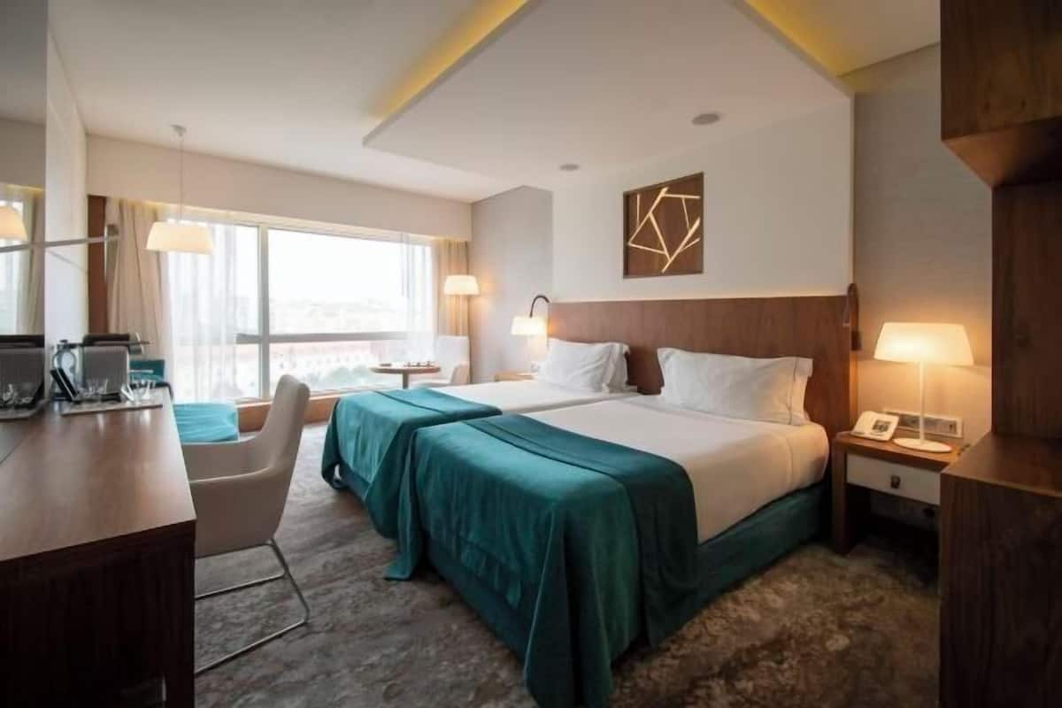Ropa de cama de alta calidad y minibar
