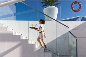 Indoor pool, seasonal outdoor pool, pool umbrellas, pool loungers