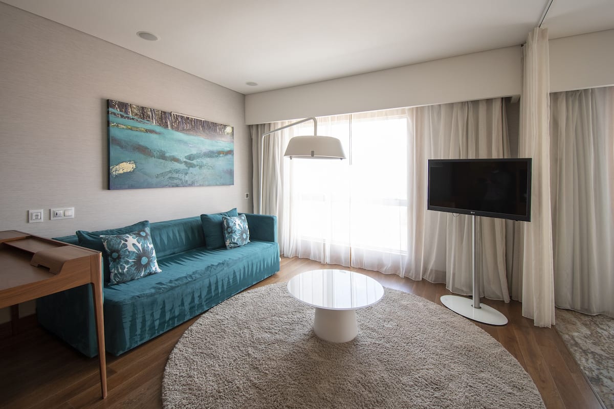 junior suite | living area | 37-inch lcd tv with cable channels, tv, pay films