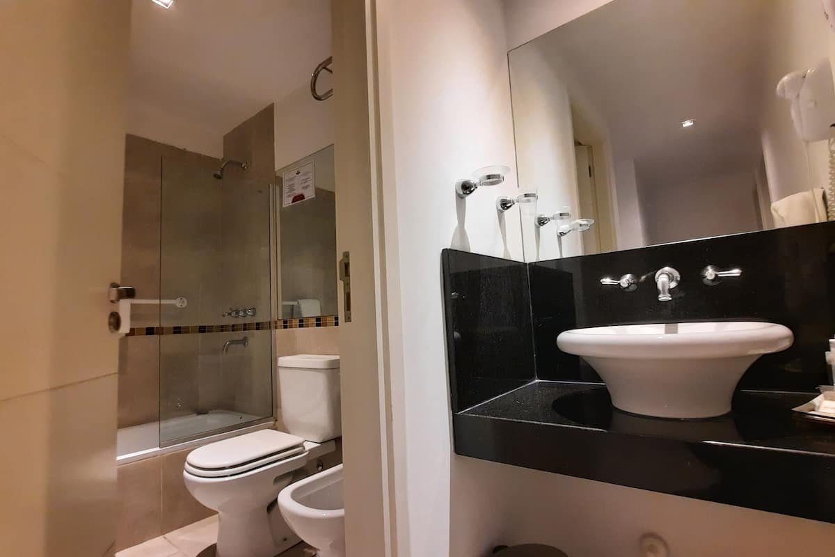 combined shower/bathtub, deep-soaking bathtub, rainfall showerhead