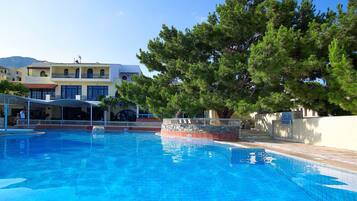 Indoor pool, outdoor pool, pool umbrellas, sun loungers