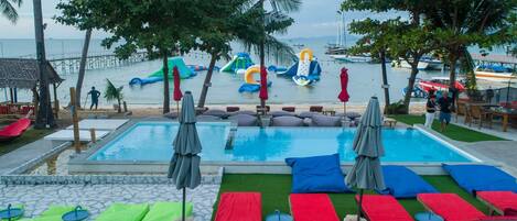 Outdoor pool, pool umbrellas, sun loungers