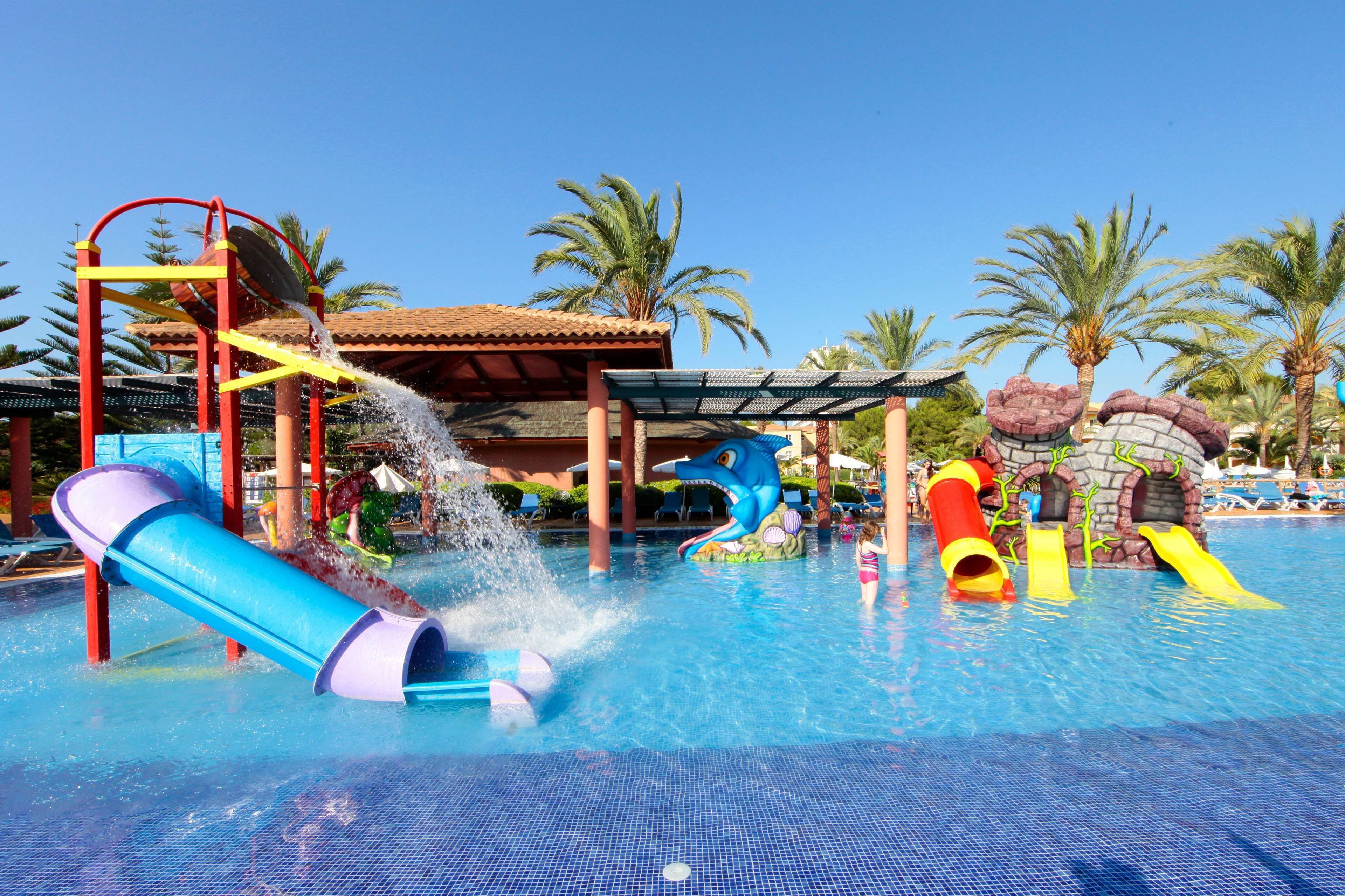 A water park with slides and a pool.