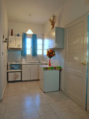 Appartement | Cuisine privée | Réfrigérateur, plaque de cuisson, cafetière/bouilloire