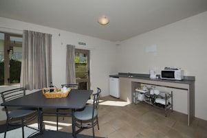 Fridge, microwave, toaster, cookware/dishes/utensils