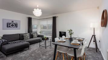 Classic Apartment | Living area | Flat-screen TV