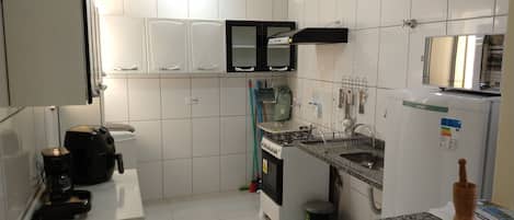 Microwave, coffee/tea maker, cookware/dishes/utensils