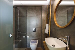 Shower, hair dryer, towels, shampoo