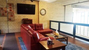 Smart TV, fireplace, DVD player, foosball