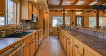 Riverfront home with pond, patio, deck, and kitchen + kitchenette - near trails