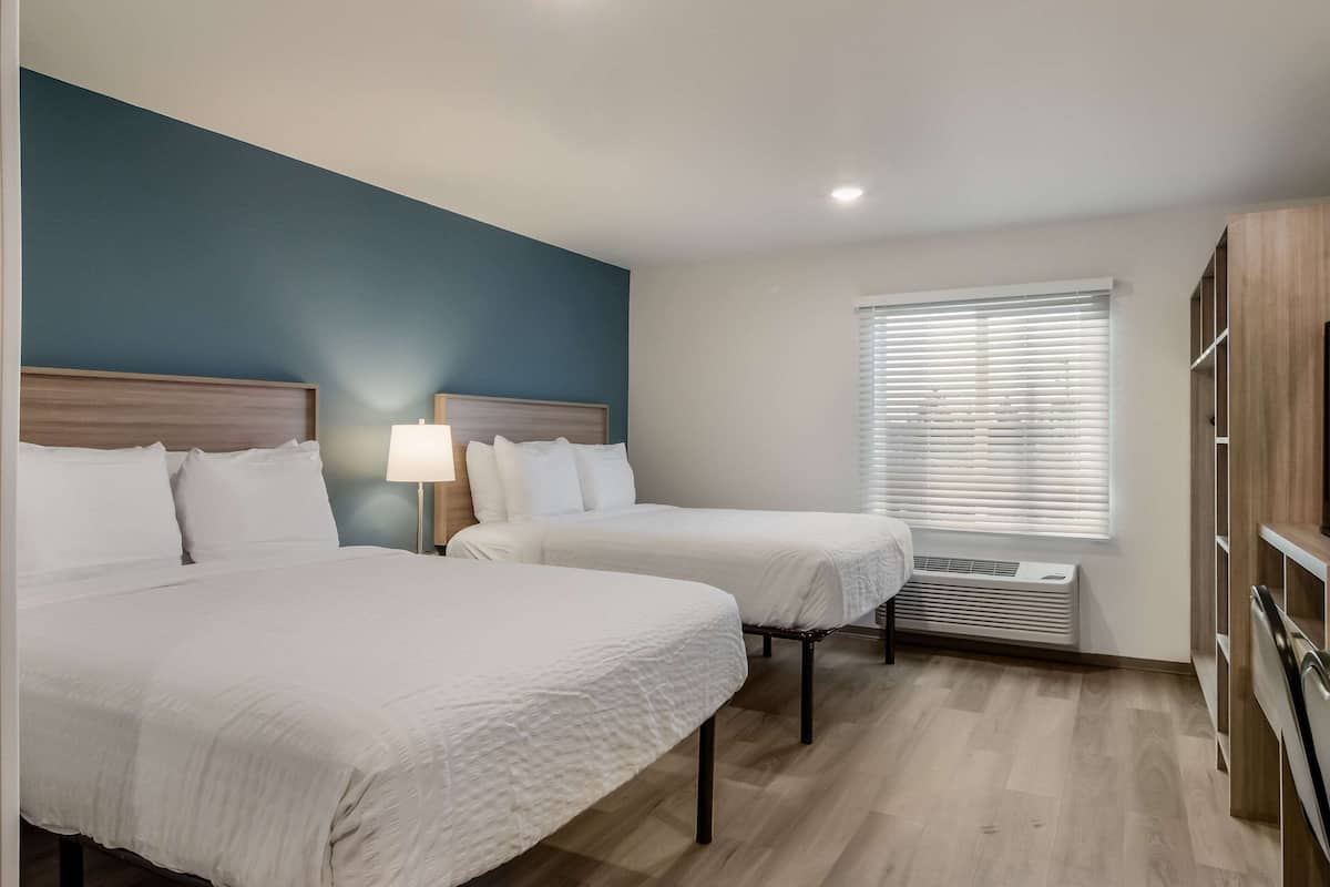 Desk, laptop workspace, blackout curtains, free WiFi