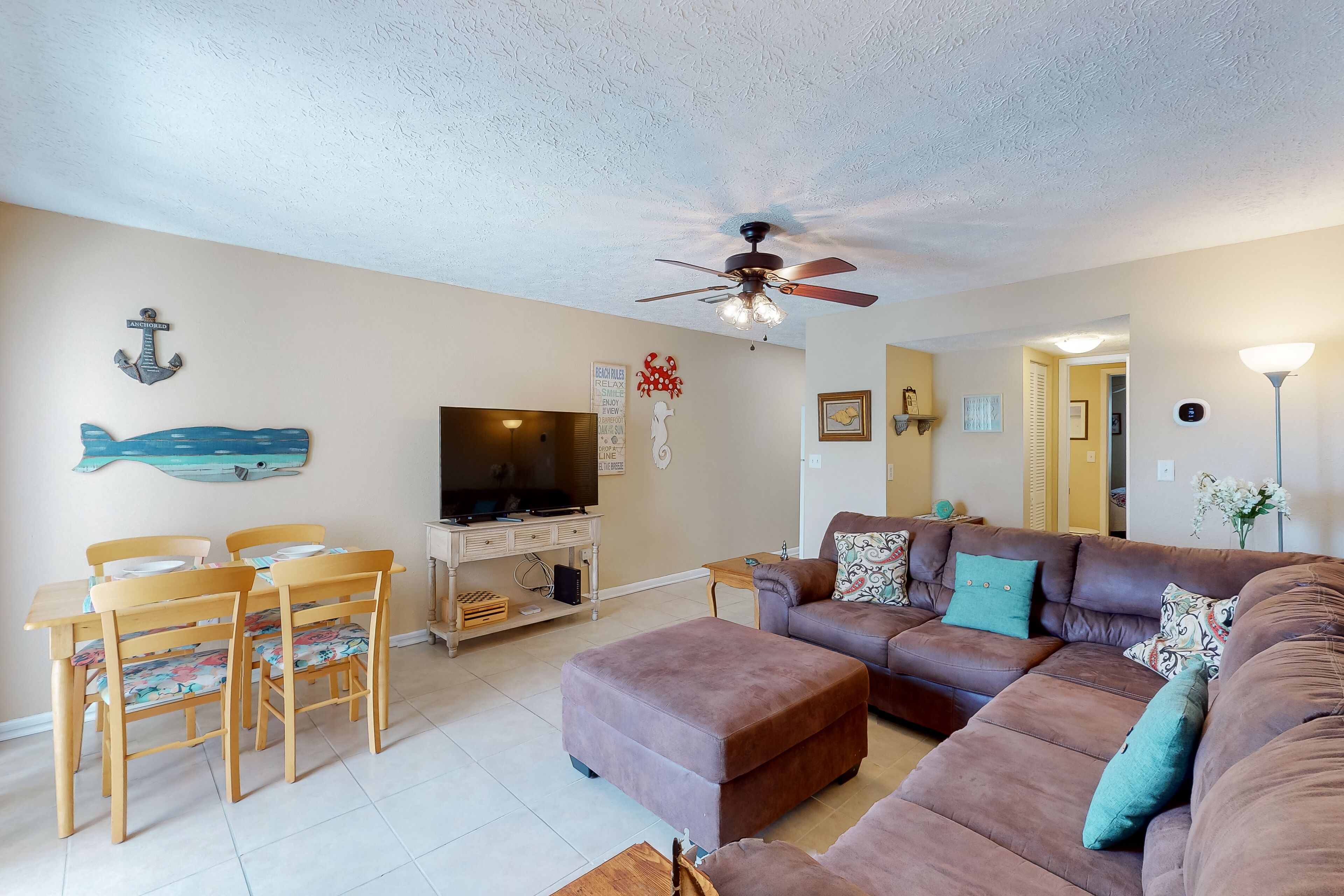 Two-story oasis near the beach w/ shared pool, patio, & ideal location!