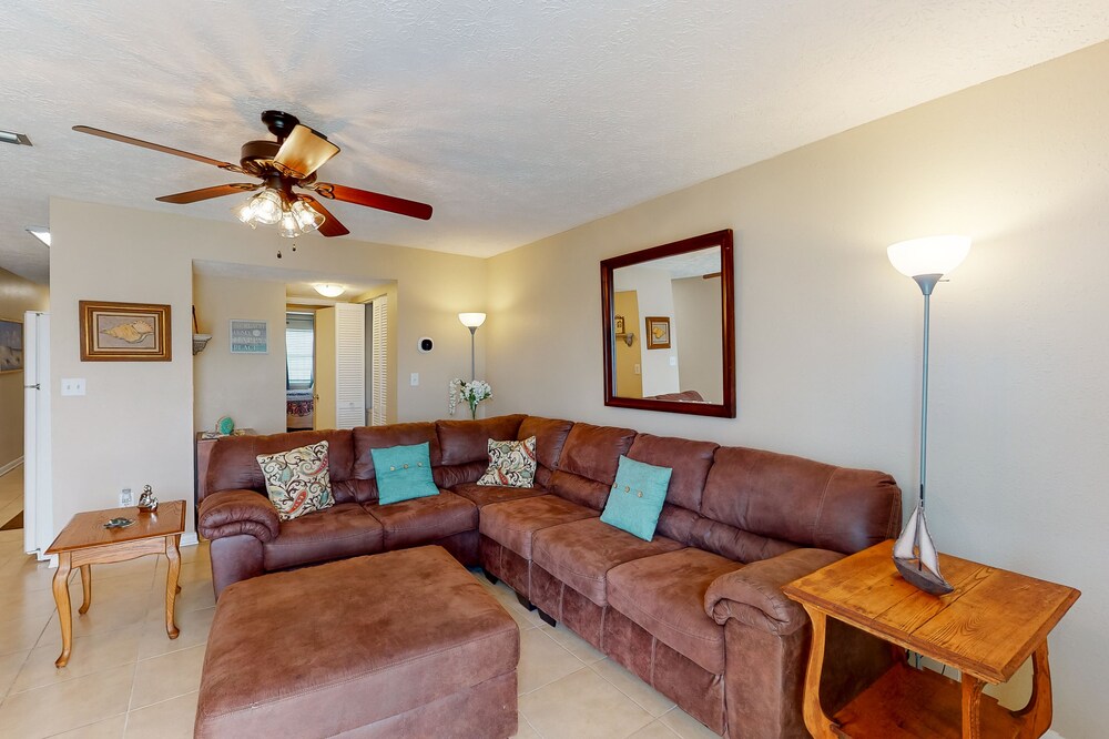 Two-story oasis near the beach w/ shared pool, patio, & ideal location!