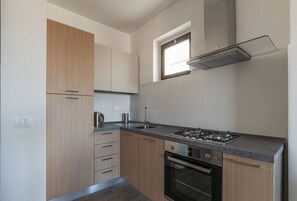 Private kitchen - GuestHost - Comfortable apartment located on the sixth floor of a modern residence equipped with a lift.In 40 square meters of space it comfortably accommodates two people with a double bedroom.Located in the Fonte Laurentina district, near the ring road (Roma)