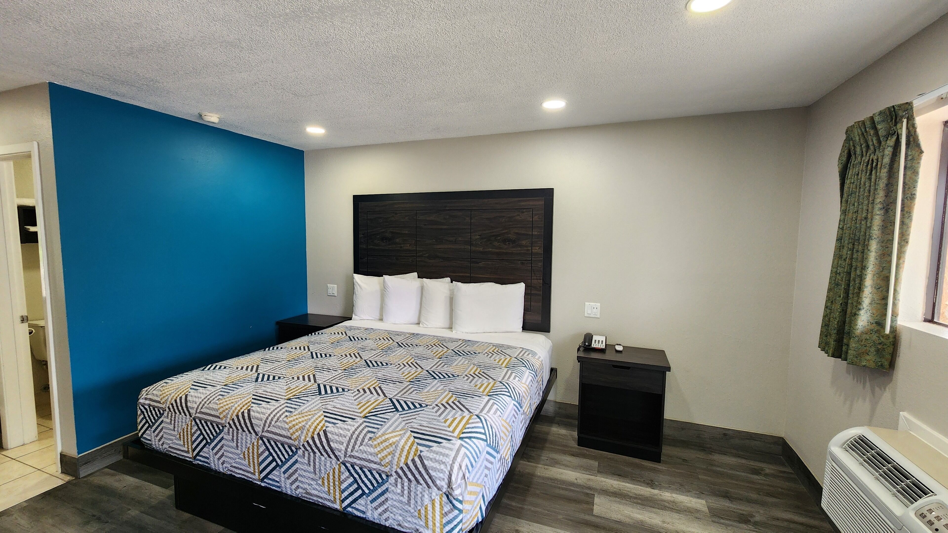 Pillowtop beds, desk, laptop workspace, blackout drapes