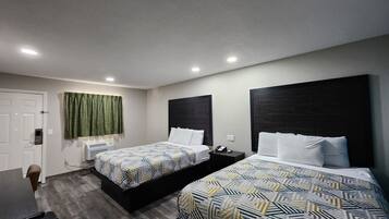 Pillowtop beds, desk, laptop workspace, blackout drapes