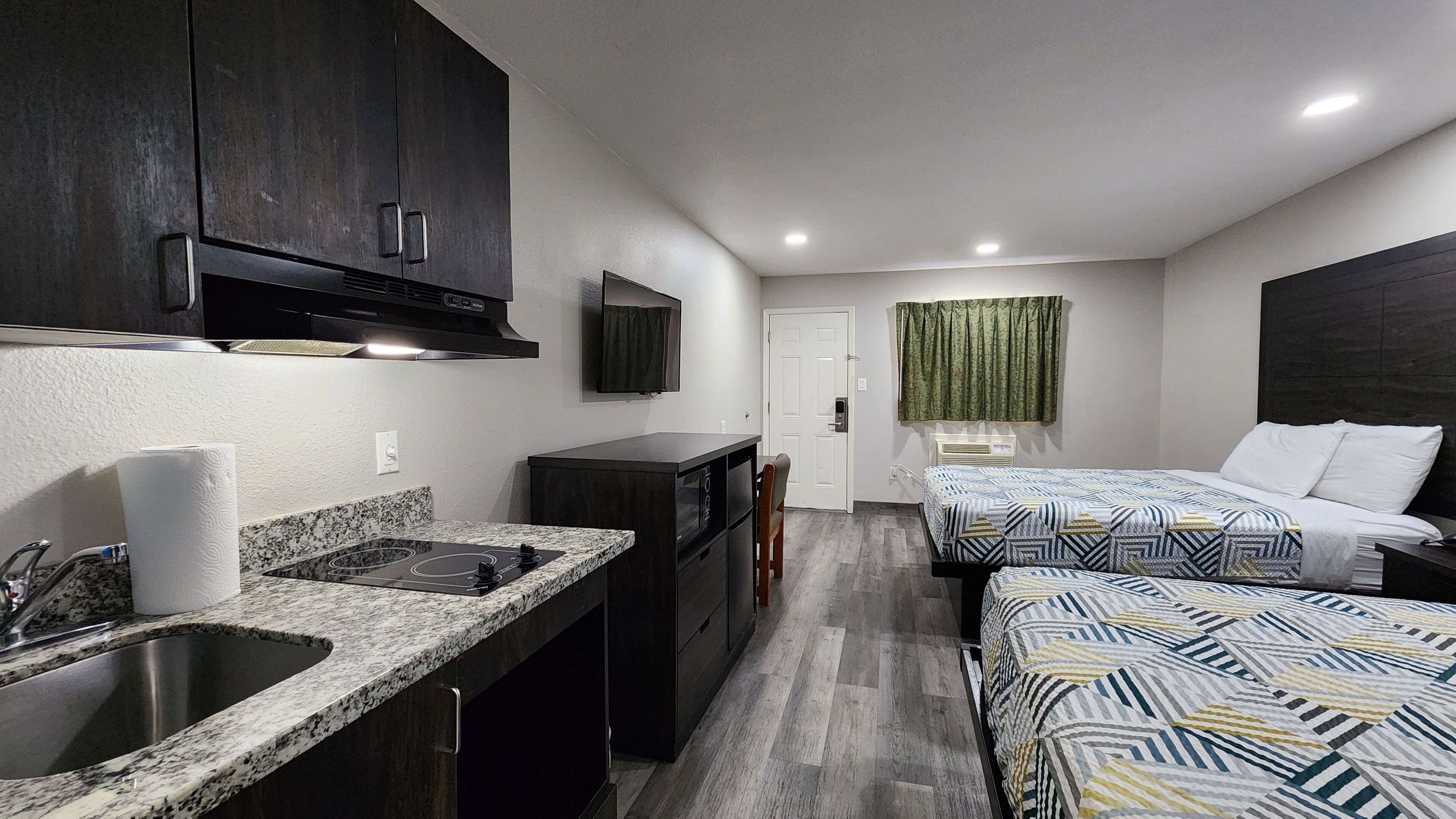 Pillowtop beds, desk, laptop workspace, blackout drapes