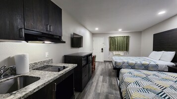 Colchones con pillow-top, escritorio y espacio para trabajar con laptop