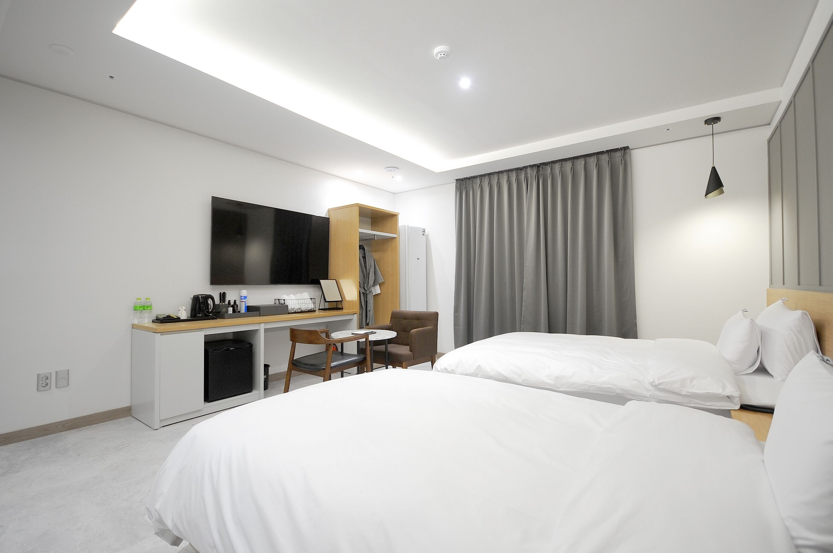 deluxe twin room | individually furnished, laptop workspace, free wifi, bed sheets