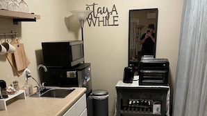 A compact kitchen with a sink, a microwave, a coffee maker, and a wine cooler. - Located in # 6 golf community, close to First Health Moore Regional Hospital.  (Pinehurst)