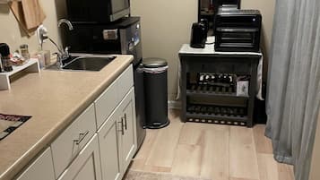 Fridge, microwave, coffee/tea maker, electric kettle