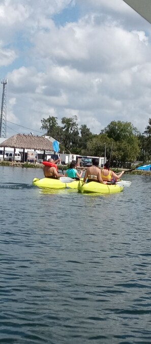 A body of water with inflatable boats. - MANATEE WATCH DEN 1 BEDROOM PET FRIENDLY (Crystal River)