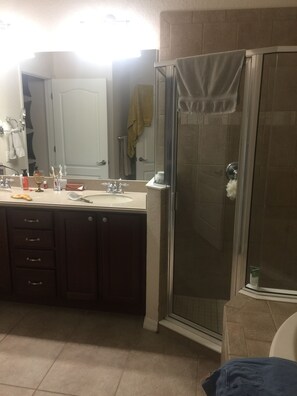 Combined shower/tub, hair dryer, towels, soap