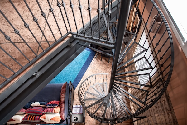 The loft's spiral staircase.