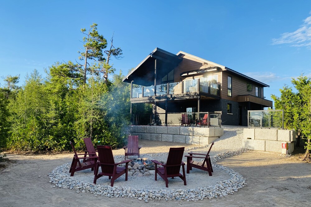 Modern cottage in the Bruce Peninsula with amazing sunset views.