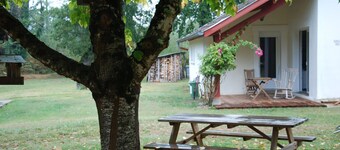 In the shade of the great oaks or in front of a roaring fire