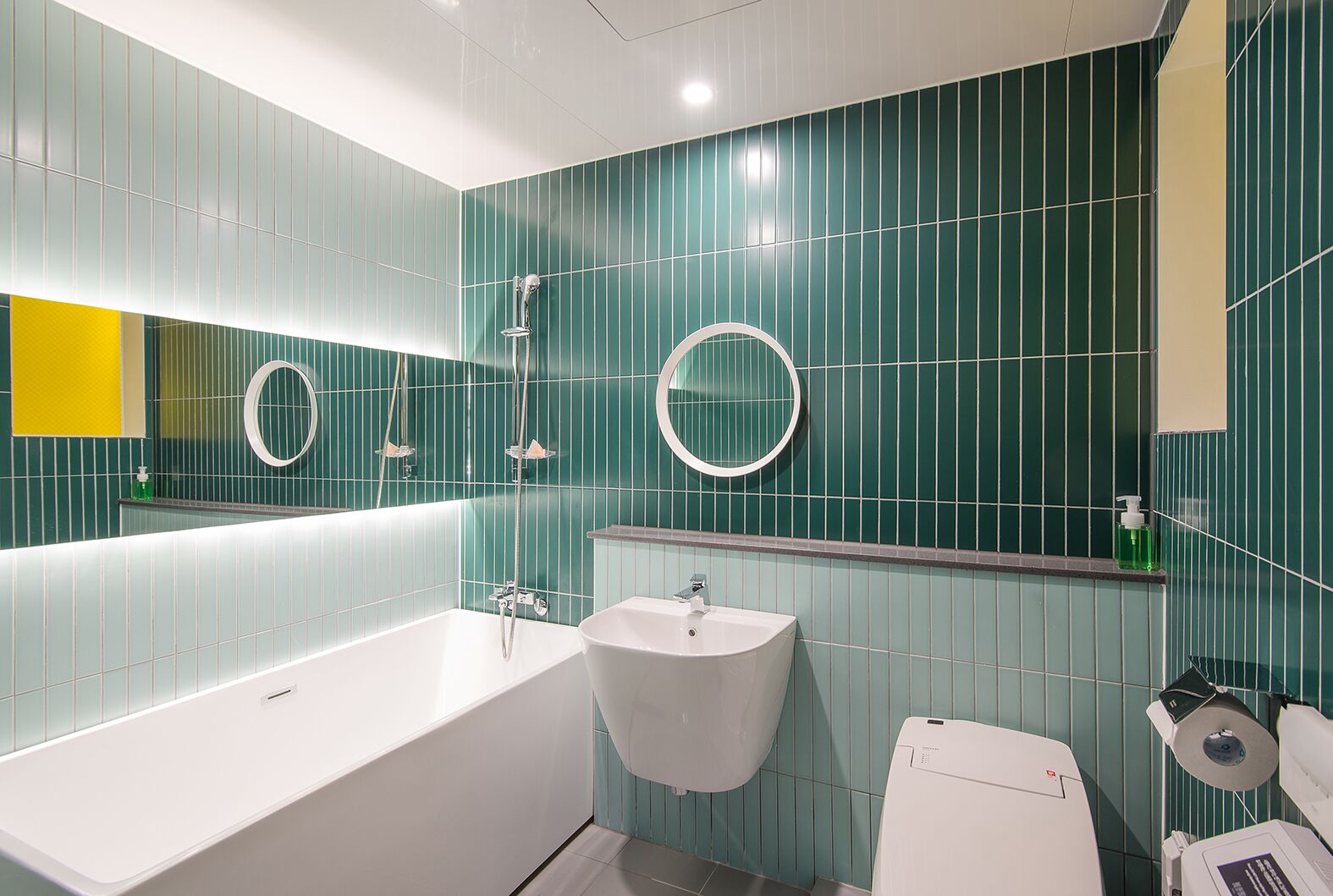 blo by blo room | bathroom | hair dryer, bathrobes, slippers, towels