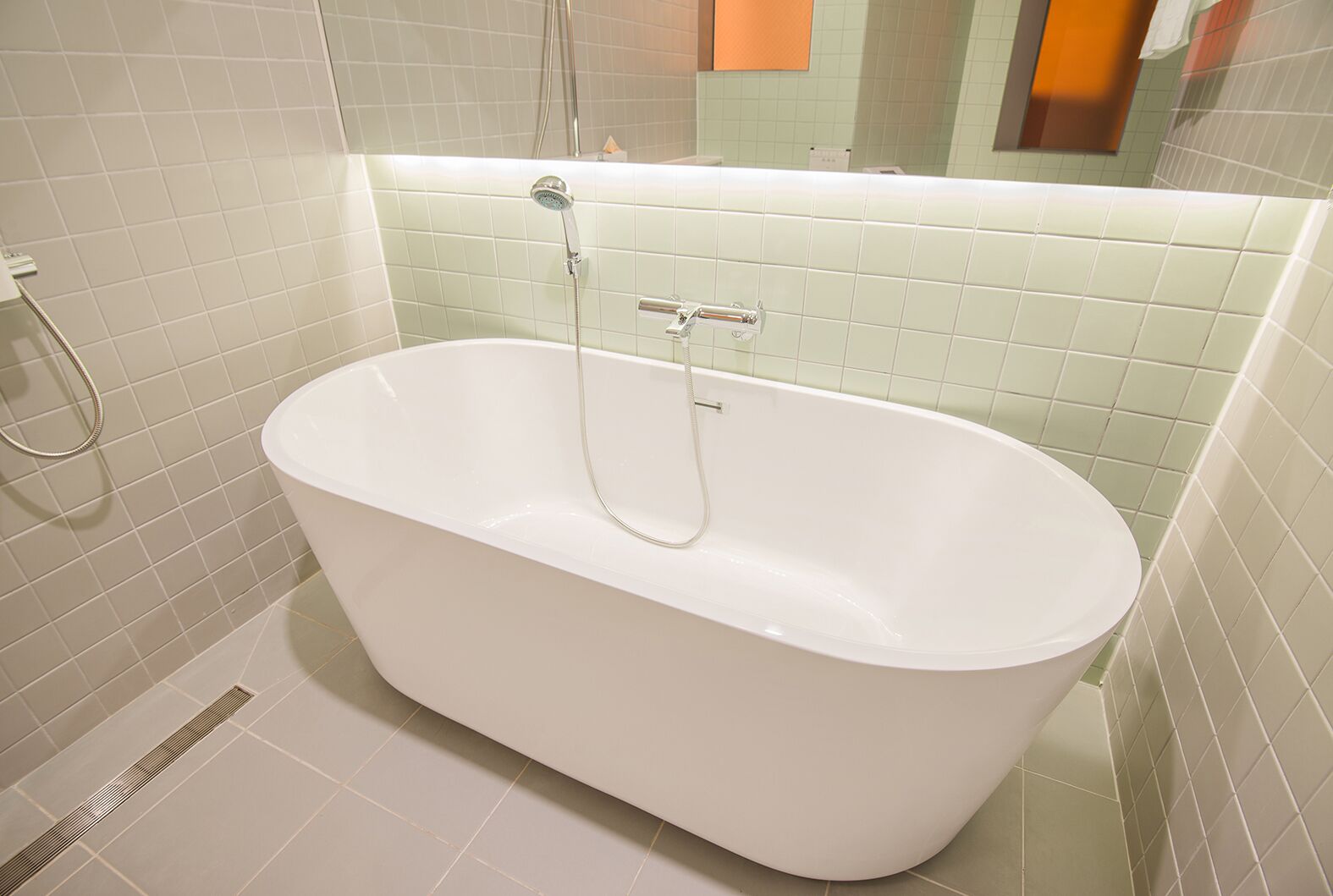 family suite | bathroom | hair dryer, bathrobes, slippers, towels