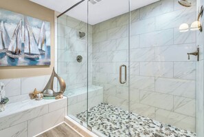 Combined shower/tub, hair dryer, towels, soap