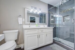 Combined shower/tub, hair dryer, towels, soap