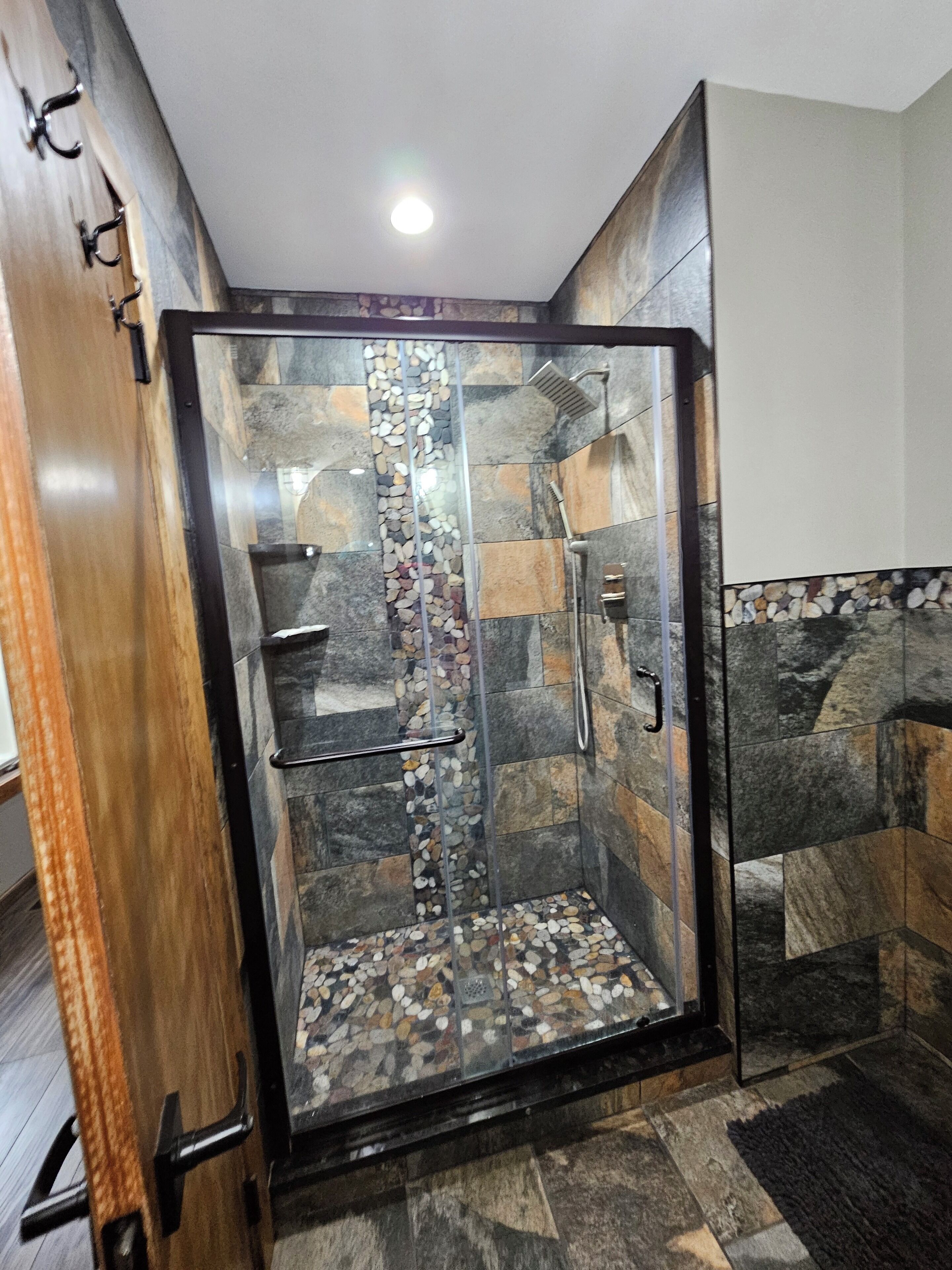 Combined shower/bathtub, hair dryer, towels, soap