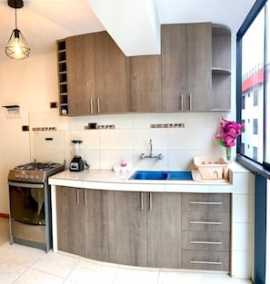 Fridge, microwave, oven, electric kettle