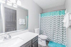 Shower, hair dryer, shampoo