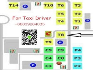 Taxi information board with QR code and contact number for easy transportation access.