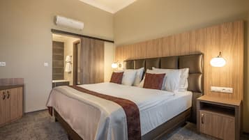 Select Comfort beds, minibar, in-room safe, desk