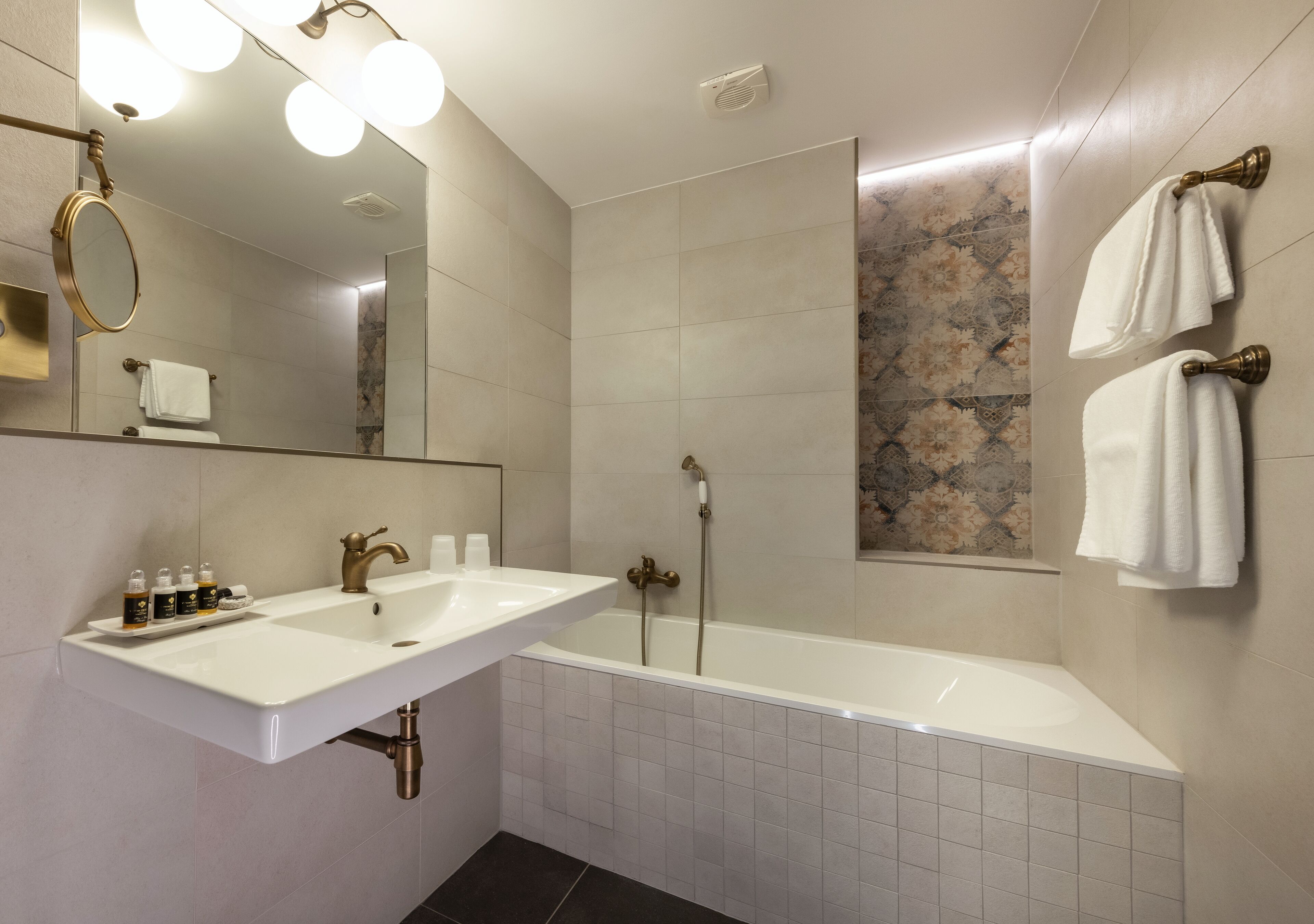 executive room (spa access) | bathroom | rainfall showerhead, designer toiletries, hair dryer, bathrobes