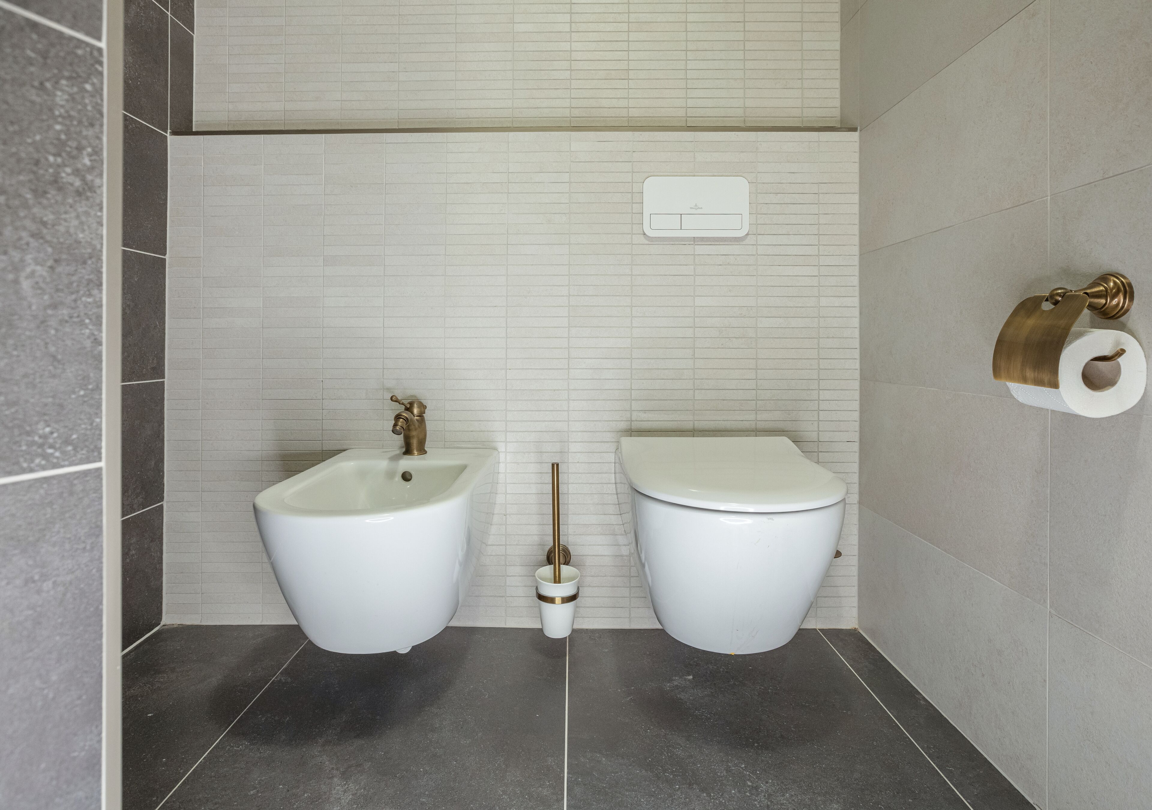 deluxe junior suite with balcony (spa access) | bathroom | rainfall showerhead, designer toiletries, hair dryer, bathrobes