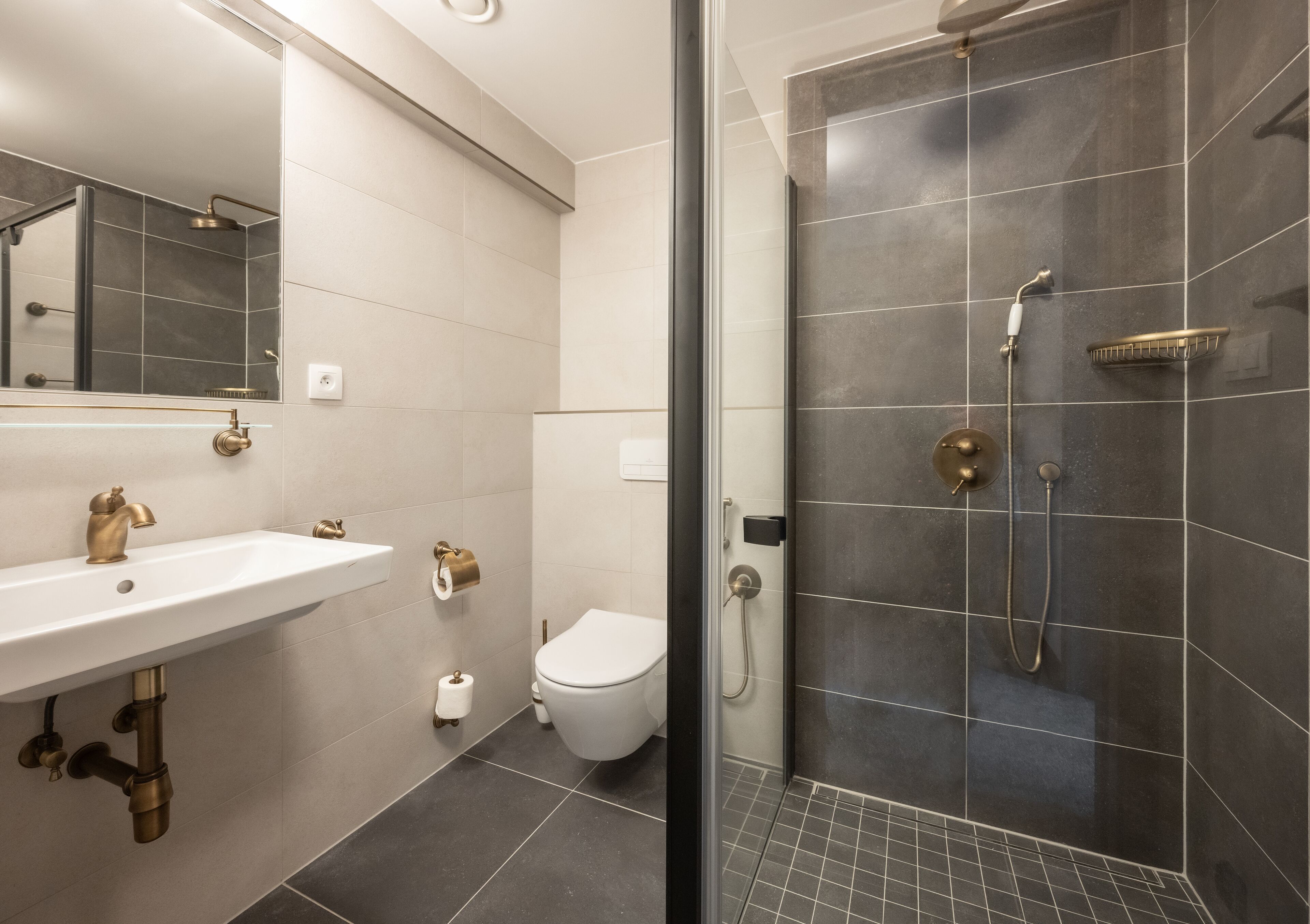 junior suite with balcony (spa access) | bathroom | rainfall showerhead, designer toiletries, hair dryer, bathrobes