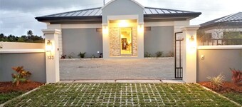 Sea Glass Villa Tobago in a 24-hr manned gated community close to beaches