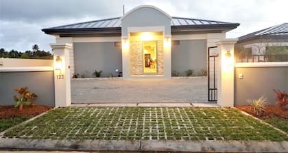 Sea Glass Villa Tobago in a 24-hr manned gated community close to beaches