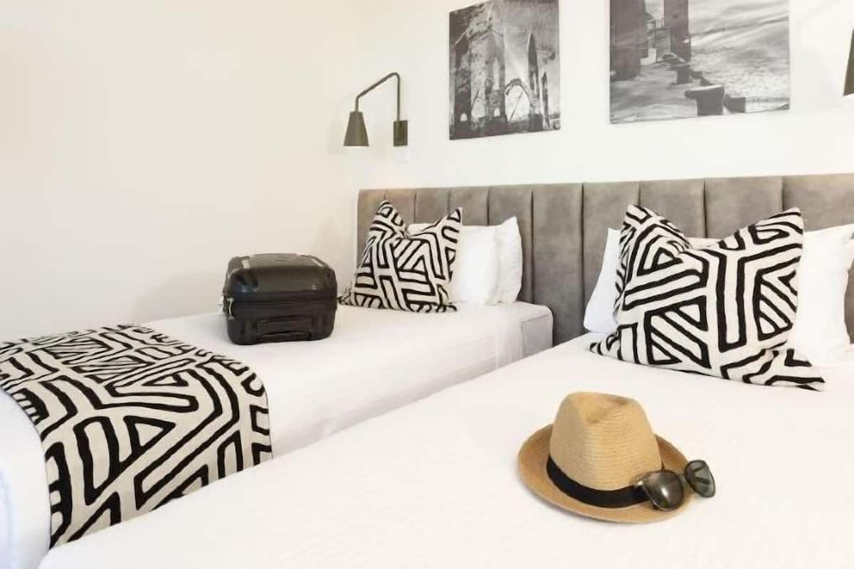 Premium bedding, pillow-top beds, in-room safe, laptop workspace