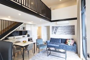 2 Bedroom Loft Apartment | Living area | 43-inch Smart TV with cable channels, TV, Netflix