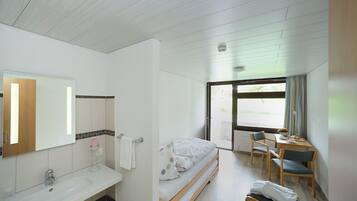 Down duvets, Select Comfort beds, in-room safe, desk